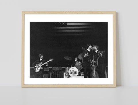 The Beatles - Performing Infront Of American Flag Art Print
